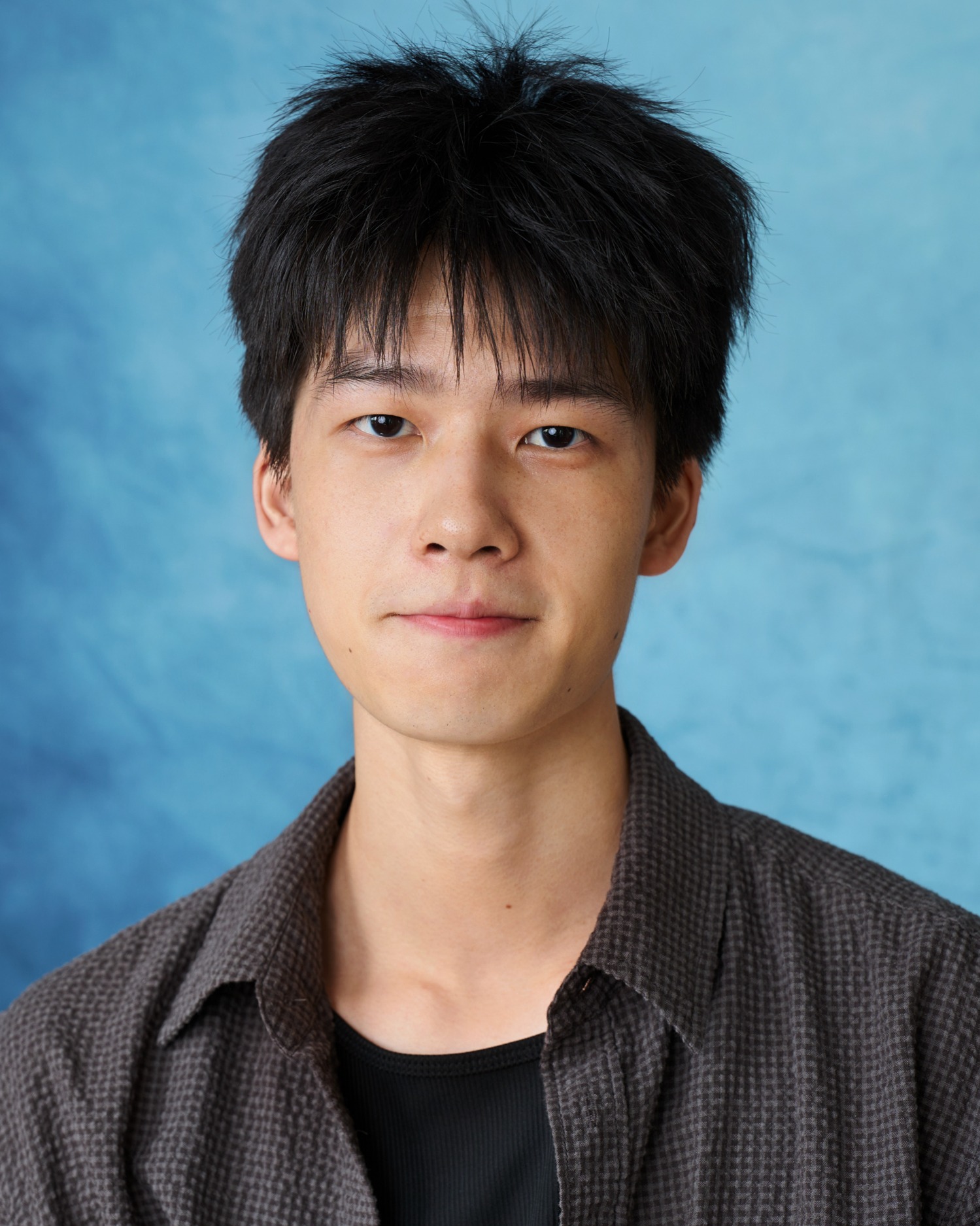 Fred in a dark overshirt, looking directly at the camera